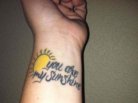 you are my sunshine tattoo on wrist Small You Are My Sunshine Tattoo, My Sunshine Tattoo, Tattoo Design Ideas For Women, Sunshine Tattoo, Romantic Tattoo, Tattoos With Kids Names, Mother Tattoos, Text Tattoo, Tattoo For Son