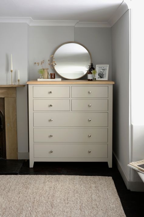 Sophisticated but with a nod to the rustic. The spacious drawers will answer most clothing storage needs and the gorgeous stone grey painted finish. #bedroominspo #oakchestofdrawers #dresserstyling Double Chest Of Drawers Master Bedrooms, Bedroom Dresser Storage Ideas, Chester Drawers Ideas Decor, Chester Drawers Bedrooms, Bedroom Chest Of Drawers Styling, Wooden Chest Of Drawers Bedroom, Bedroom Drawers Ideas, Dresser Storage Ideas, Chest Of Drawers Styling