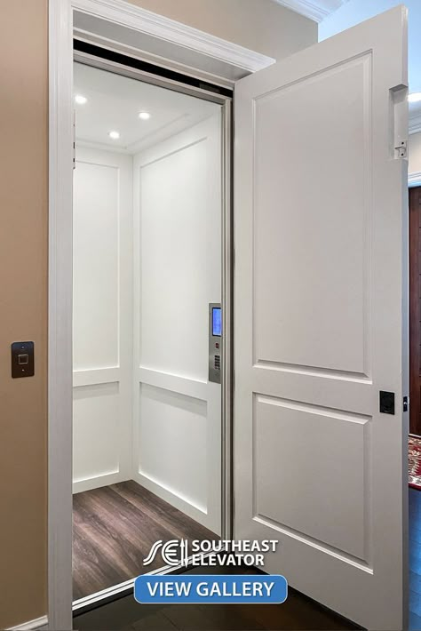 White Shaker style residential elevator with a touchscreen car operating panel and four LED lights Indoor Home Elevators, Home With Elevator, Indoor Elevator Home, Residential Elevator Design, Home Elevator Ideas, Residential Elevator Interior Design, Home Lifts Elevator, In Home Elevator, Hidden Elevator In House