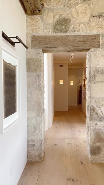 Stone Archway Interior, Half Stone Wall, Stone Foyer, Plaster Lighting, Stucco Interior, Stone Wall Interior, Marie Flanigan Interiors, Marie Flanigan, Interior Door Styles