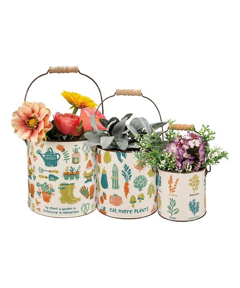 Blue & White 'To Plant a Garden' Storage Bucket - Set of Three. Whether you use them as homes for your plants or to corral clutter, these metal buckets add a cheerful element to your space with their floral motif and inspirational typography. Includes three blue and white herb and veggie storage bucketsFull graphic text (small): Parsley, sage, rosemary, thyme (repeating).Full graphic text (medium): Eat more plants.Full graphic text (large): To plant a garden is to believe in tomorrow.Small: 4.75 Veggie Storage, Eat More Plants, Metal Buckets, Plant A Garden, Small Cactus, Beige Ceramic, Tin Can Crafts, Small Buckets, Inspirational Typography