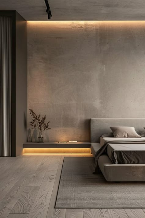 A minimalist bedroom with soft gray tones throughout, creating a soothing atmosphere. The sleek modern bed complements the overall design, while indirect lighting enhances the ambiance. Bedroom New Ideas, Light Modern Interior, Bedroom Lighting Ideas Modern, Bedroom Open Space, Concrete Bedroom Ideas, Modern Minimalist Master Room, Bedroom Indirect Lighting, Main Bedroom Wallpaper, Concrete Wall Bedroom Interior Design