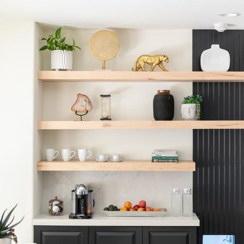 Black-and-White Kitchen with Neutral Breakfast Nook | HGTV Bar With Floating Shelves, Modern Breakfast Nook, Sliding Cabinet Doors, Home Coffee Stations, Coffee Nook, Wicker Dining Chairs, Home Coffee Bar, Coffee Bar Home, White Shelves