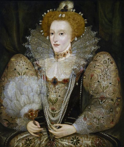 Anonymous British, 16th century Oil on canvas Toledo Museum of Art Toledo, Ohio  Resplendent with pearls, gold, jewels, lace, red wig, and ostrich feather fan, England's queen Elizabeth I (reign 1588-1603) is a dazzling and commanding figure in the portrait by an unknown artist.  This portrait is based on an official life-portrait done about the time of British naval defeat of the Spanish Armada 1588, when Elizabeth was 54.  She is dressed in the most elaborate of costumes, the satin embr... Elizabeth Queen Of England, Elizabethan Fashion, Her Poetry, 16th Century Fashion, Toledo Museum Of Art, Elizabethan Era, Lizzie Hearts, Queen Dresses, Tudor History