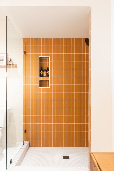 Vertical Subway Tile Shower Ideas, Orange Tile Bathroom, Shower Niche Ideas, Elegant Backsplash, Subway Tile Showers, Accent Tiles, Niche Ideas, Subway Tiles Bathroom, Orange Tiles