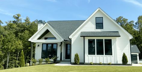 This home is Featuring Hardie Siding Exterior. White Horizontal Siding and White Board & Batten (Verticle) Siding. Hardie Siding is a Low Maintenance Product. Hardie Siding Exterior, White Horizontal Siding, Horizontal Siding, Modern Siding, Hardie Board, Hardie Siding, Board Batten, Modern Farmhouse Kitchens, Exterior Siding