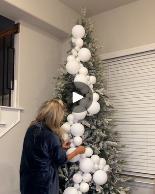 6M views · 65K reactions | Unique way of decorating a Christmas tree | A new way to decorate your tree this year! 🎄 | By LADbible | Facebook Christmas Tree With Big Balls, Christmas Tree Big Ornaments Decorating Ideas, Christmas Trees With Large Ornaments, Snowball Christmas Tree, Cascade Ornaments On Tree, Christmas Ball Garland Decorating Ideas, Christmas Tree Unique Ideas, How To Decorate My Christmas Tree, Christmas Tree How To Decorate