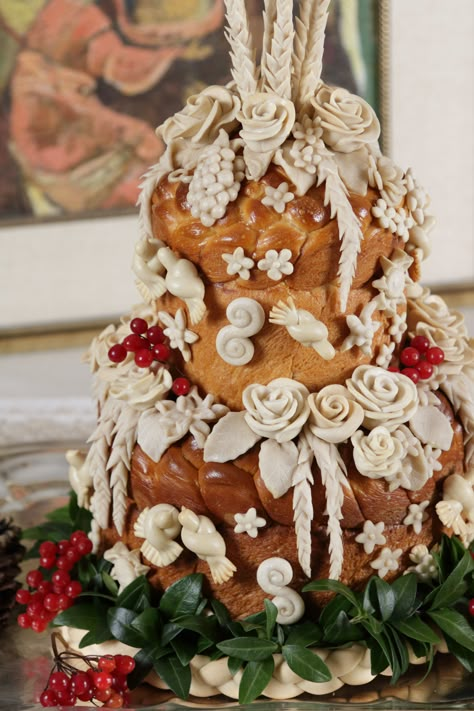 Two-tier traditional Ukrainian wedding bread "Korovai" including wheat, flowers, doves, swirls, pine cones, grapes, braids, periwinkle and kalyna. Ukrainian Wedding Korovai, Traditional Ukrainian Wedding, Ukrainian Wedding Cake, Ukrainian Wedding Bread, Ukrainian Wedding Decorations, Vinok Ukrainian, Ukrainian Wedding Traditions, Slavic Wedding, Ukraine Wedding