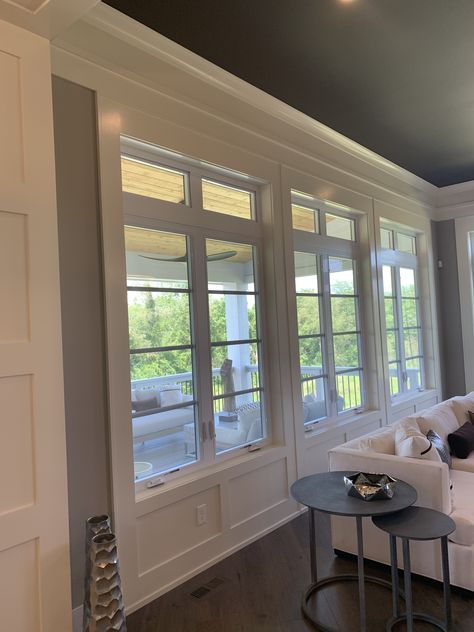 Wainscoting around windows in great room Window Trim With Wainscoting, Framing Around Windows, Wainscotting With Windows, Wainscoting Ideas Around Windows, Window Wainscoting, Wainscoting Window Wall, Wainscotting Around Windows, Paneling Around Windows, Wainscoting With Windows