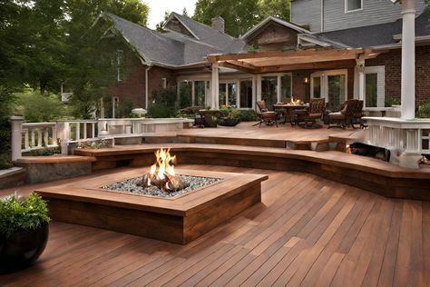 Warmth and Style Combined: Composite Wood Decks with Fire Pits for Cozy Evenings Deck With Pergola And Fire Pit, Fire Pit In Deck, Diy Ground Level Deck, Fire Pit On Wood Deck, Deck Steps Ideas, Deck Step Lighting, Deck And Fire Pit, Deck With Fire Pit, Backyard Deck Designs