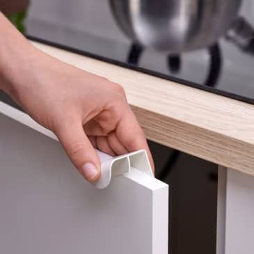 These $2 IKEA Pulls Transform Dated Cabinets (with No Tools!) | Apartment Therapy Dated Cabinets, Diy Cabinet Handles, Ikea Kitchen Drawers, Cabinet Handles Kitchen, Minimal Traditional, Ikea Cabinet, Kitchen Bohemian, Before After Kitchen, Ikea Products