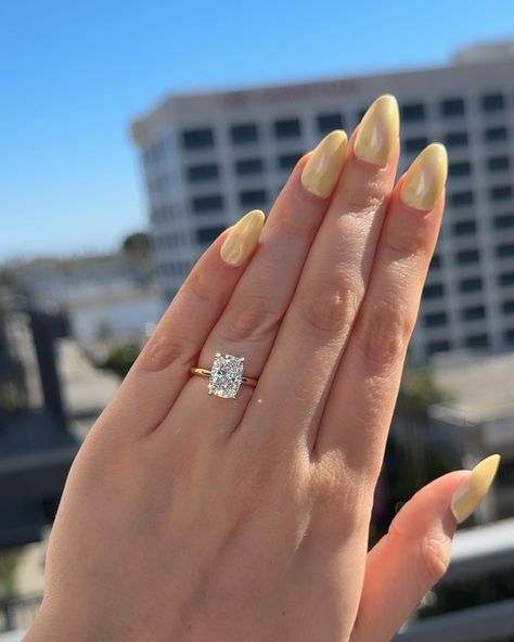 Elongated Cushion Cut💍 Elongated cushions are long, elegant stones that make incredible engagement rings. Because of their slender shapes, they look larger than many other cuts of the same carat weight✨ Save for inspo!💍 . . . engagement rings, wedding rings, ring inspo, wedding season, jewelry trends, custom jewelry, yellow gold rings, hidden halo #cushioncut #cushioncutdiamond #cushioncutengagementring #elongatedcushion #weddingrings #ringinspo #jewelrydesign #customrings 2 Carat Elongated Cushion Cut, Elongated Cushion Engagement Ring Gold Hidden Halo, Elongated Cushion Cut Engagement Ring With Hidden Halo Setting, Elongated Cushion Engagement Ring With Wedding Band, Elongated Cushion Engagement Ring Gold, Wedding Rings Gold Band, Cushion Engagement Ring Gold, Elongated Cushion Engagement Ring, Elongated Cushion Cut Engagement Ring