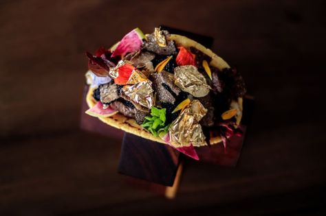 Shrimp, caviar, truffle and gold flakes aren't standard ingredients in Mexico's popular tacos. But chef Juan Licerio Alcala uses them to create the world's most expensive taco at $25... Tacos Mexicanos, Wheat Tortillas, Luxury Vacation, Interesting Facts, Facts About, Truffles, Acai Bowl, Food Photography, Chili