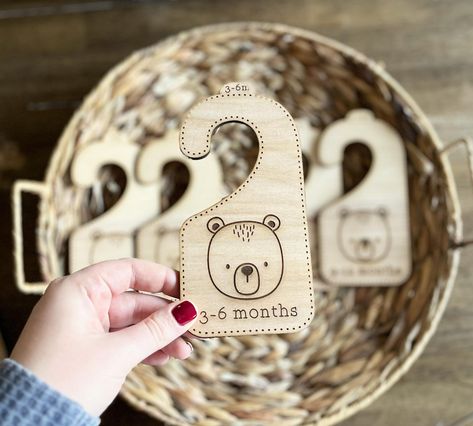 Our closet organizers are the perfect way to keep your little one's clothing sizes organized and easily accessible as they grow! These hangers measure approximately 3 inches wide and 7 inches tall. These are made of birch. Please note that wood is a natural material and there will be slight differences in the color and/or grain. The wood may possibly contain knots. No two products can be exactly alike, but we strive to create high-quality and beautiful products every time. Options include: - Sizes NB-12 Months (5 Hangers) -Sizes NB-24 Months (7 Hangers) -Sizes NB-4T (10 Hangers) All products are made to order, so please allow us 5-7 days to create and ship your hangers.