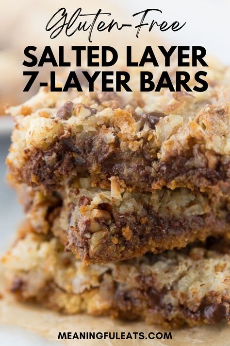 Three 7 layers bars stacked on top of each other made with toasted coconut, pecans, chocolate chips Gluten Free Seven Layer Bars, Gluten Free 7 Layer Bars, Seven Layer Cookies, 7 Layer Cookies, Meaningful Eats, Seven Layer Bars, 7 Layer Bars, Gluten Free Graham Crackers, Best Gluten Free Desserts