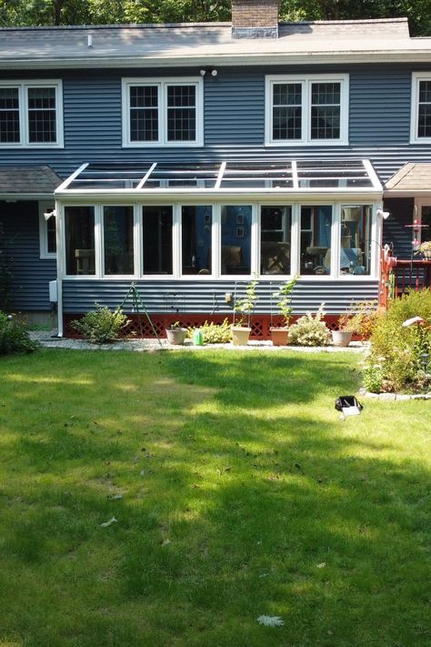 This beautiful sunroom in Colchester, CT, has been a peaceful retreat for over 20 years! Featuring wall-to-wall windows and a stunning glass roof, it offers perfect views of the lush green backyard. Our team at Creative Enclosures has maintained and upgraded it to ensure it's just as beautiful as the day it was completed. Find inspiration for your next sunroom project with us!  #SunroomDesign #GlassRoof #HomeRetreat #NatureViews #CreativeEnclosures #ColchesterCT #SunroomInspiration Sunroom Inspiration, Four Season Sunroom, Green Backyard, Home Re, Sunroom Designs, Design Installation, Sunrooms, Glass Roof, Four Season