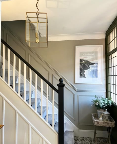 1930s Hallway Panelling, Tall Hallway Panelling, Wood Paneling Stairs, Hallway Ideas Dado Rail, Bannister Painting Ideas, Dado Rail Stairs, Painted Spindles On Stairs, Black Bannister Rail, Bannisters And Railings