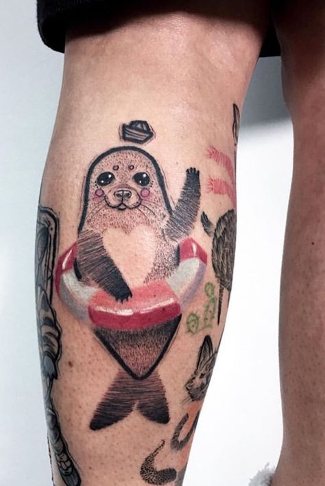 Joanna kru seal tattoo Seals Tattoo, Small Seal Tattoo, Cute Seal Tattoo, Cubital Fossa Tattoo, Seal Tattoo Simple, Monk Seal Tattoo, Seal Tattoo, Cute Seals, Old School Tattoo