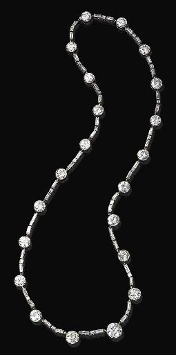 AN ELEGANT ART DECO DIAMOND NECKLACE, BY BOUCHERON. Designed as a series of twenty-one graduated diamond collets, joined by square and baguette-cut three-stone diamond links, mounted in platinum, circa 1925, 20½ ins. Signed Boucheron, Paris. #ArtDeco #Boucheron #necklace Boucheron Necklace, White Diamond Jewelry, Diamond Tennis Necklace, Jewel Necklace, Large Image, Art Deco Necklace, Elegant Art, Cluster Pendant, Modern Necklaces