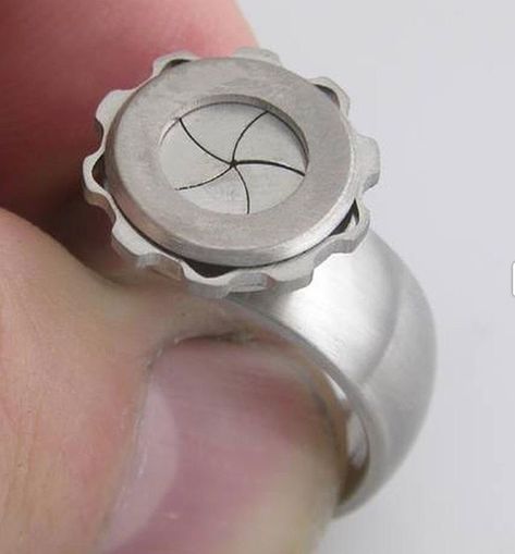 It's a ring AND a toy! (kind of!) I love novel and fidget jewelry and this ring has both! #repost @boonerings . This ring is called Iris. Made from aerospace grade titanium and laser cut and laser welded. The mechanical shutter closes to protect the stone from nuclear blasts and other unpleasantness.  #uniquejewelry #fidgetjewelry #titaniumjewelry #ringsofinstagram #photography Mechanical Jewelry, Mechanical Iris, Fidget Jewelry, Iris Ring, Kinetic Jewelry, Laser Welding, Titanium Ring, Titanium Jewelry, Titanium Rings