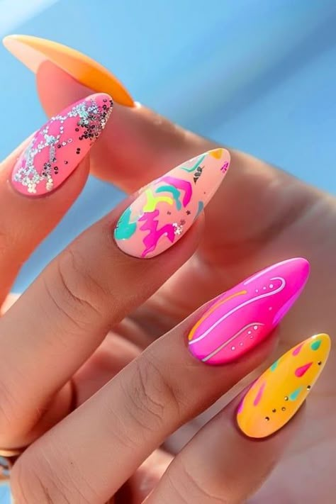 Neon nail art bright summer nails. Coffin Bright Nails, Bright Summer Nails Designs Color Combos, Bright Summer Nails Coffin, Nails Almond Bright, Bright Summer Nails Almond, Bright Summer Nails Almond Shape, Bright Summer Nails Designs Neon, Summer Nails Pink And Orange, Nails Pink And Orange