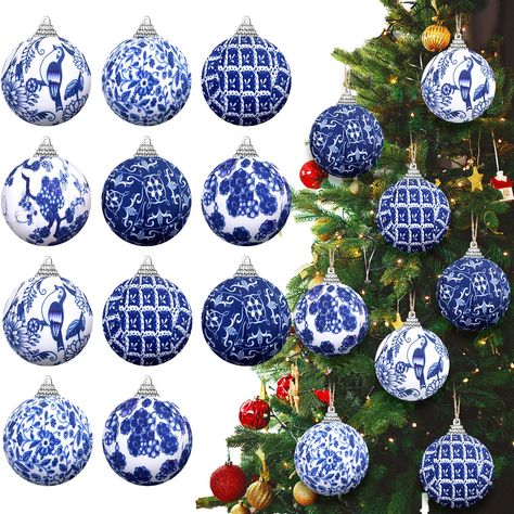 PRICES MAY VARY. Chinoiserie Original Design: immerse your holiday decor in the timeless beauty of chinoiserie artistry, these 12 exquisite chinoiserie Christmas ornaments feature an enchanting blue and white pattern, inspired by the traditional motifs of East Asian design; Indulge in a touch of sophistication that will elevate your Christmas decorations to a different level of elegance Quality Materials: these Chinese Christmas ornaments are made with quality foam and covered in polyester fabri Chinoiserie Christmas Decor, Christmas Blue And White, Blue Willow Decor, Chinoiserie Ornaments, Chinese Christmas, Blue Christmas Tree Decorations, Chinoiserie Fabric, Christmas Dining Table Decor, Chinoiserie Christmas