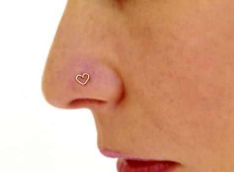 Gold heart nose ring from etsy Heart Shaped Nose Stud, Gold Heart Nose Stud, Heart Nose Piercing, Heart Nose Ring, Cute Nose Rings, Heart Nose Rings, Cute Nose Piercings, Heart Piercing, Piercing Inspo