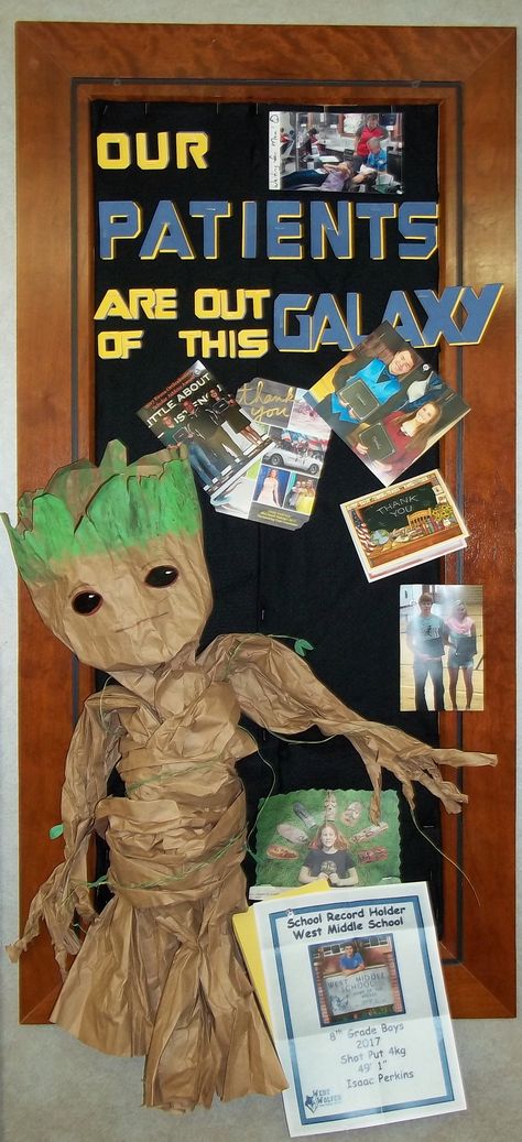 Guardians of the Galaxy themed board.  Baby groot is made from packing paper. Avengers Office, Marvel Theme Classroom, Groot Bulletin Board, Marvel Classroom Door, Guardians Of The Galaxy Door Decorations, Guardians Of The Galaxy Decorations, Avengers Classroom Theme, Guardians Of The Galaxy Classroom Theme, Avengers Classroom Door