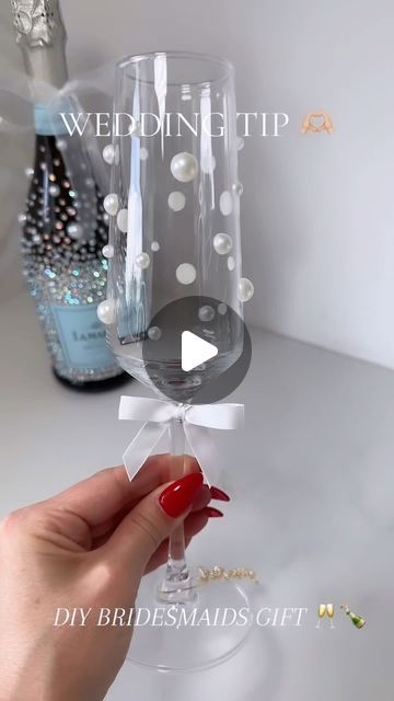 BRITTANY NICOLE ✨ on Instagram: "Wedding Tip! 🍾 PERFECT DIY BRIDESMAIDS GIFT! These super cute champagne glasses with a pearl touch ✨ they are perfect to use on your wedding day morning! I custom ordered these name charms for all my bridesmaids so we didn’t mix up our glasses while getting ready 🥂 . . . . . . #wedding #weddingday #weddinginspo #weddinginspo #diy #diywedding #diyweddingideas #bridesmaid #bridesmaids #bridesmaidgifts #weddingmorning #bride #bridal #brideinspo #brideideas #groom #inspiration #theknot #zola #weddingwire #etsy #etsyshop #etsyofinstagram #etsywedding" Bridal Party Glasses Diy, Diy Pearl Champagne Glasses, Pearl Champagne Glasses, Wedding Gift Ideas For Bride And Groom, Diy Champagne Glasses, Wedding Champagne Glasses Diy, Cute Bridesmaid Proposals, Bridal Shower Glasses, Bridal Party Champagne Glasses