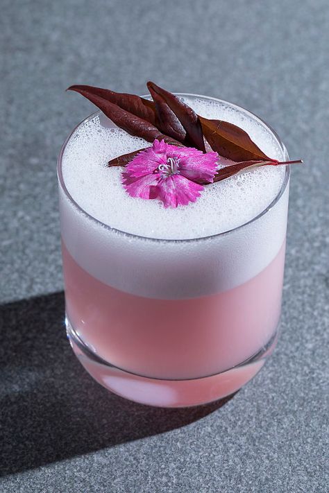 Sip Sakura Cocktails At This NYC Restaurant Covered In Cherry Blossoms Herb Syrup, Geranium Leaves, Japanese Cocktails, Drink Garnishing, Sour Foods, Cherry Cocktail, Colorful Drinks, Cocktail List, Cocktail And Mocktail