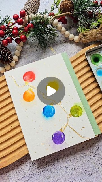 Joly Poa on Instagram: "Round Christmas Lights Using a Cap 😀 

I used the cap of my son's Pororo juice 😆 Have you tried this technique too? It's so fun!😄

#christmascard #watercolor #holidayart" Christmas Lights Watercolor Card, Christmas Light Watercolor, Joly Poa Watercolor, Watercolor Christmas Lights, December Watercolor, Christmas Lights Watercolor, Watercolor Christmas Cards, Watercolor Ideas, Watercolor Christmas