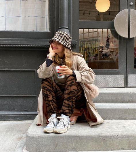 New York Winter Fashion / Style Edit / Winter Outfit Inspo / Chanel Sneakers / Animal Pattern Pants / Houndstooth Bucket Hat / Vintage Trench Coat Bucket Hat Winter Outfit, Bucket Hat Looks, New York Winter Fashion, Fall Winter Street Style, Spring Summer Street Style, Winter Bucket Hat, Janelle Monae, Jan 2025, Maximalist Style