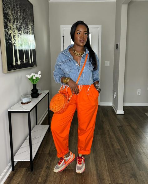 ~Recap of the OOTD~ Orange is forever that girl! Watch previous reel for step by step details! 🧡🍊 . . 📌This entire look, including the jewelry, is all linked on my @shop.ltk page linked in my bio. . . ✨What I’m wearing: *Denim jacket: @princesspollyboutique (gifted) *Pants: @amazonthedrop (linked on my LTK) *Sneakers: @nike via @stockx (linked on my LTK) *Purse: @brahmin *Necklace: @vitaly (linked on my LTK) *Bracelets: Amazon (linked on my LTK) *Anklet: @juliavaughn *Sunglasses: @topfoxx ... T Shirt And Necklace Outfit, How To Wear Orange Pants, Orange Jordans Outfit For Women, Orange Pants Outfit Summer, Orange And Denim Outfits, Orange Pants Outfit Street Style, Fall Outfits Orange, Orange Jeans Outfit, Outfits With Orange Pants