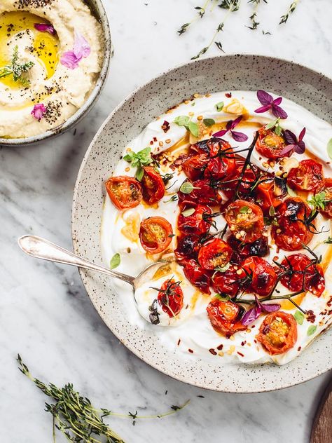 Charred Tomatoes with Cold Yoghurt (Ottolenghi)      //      cherry tomatoes, olive oil, cumin seeds, light brown sugar, garlic, thyme, oregano, lemon, extra-thick greek yogurt Ottolenghi Recipes, Tomato Dishes, Yotam Ottolenghi, A Bowl, Food Inspiration, Food Blogger, Tomatoes, Diner, Baked Dishes