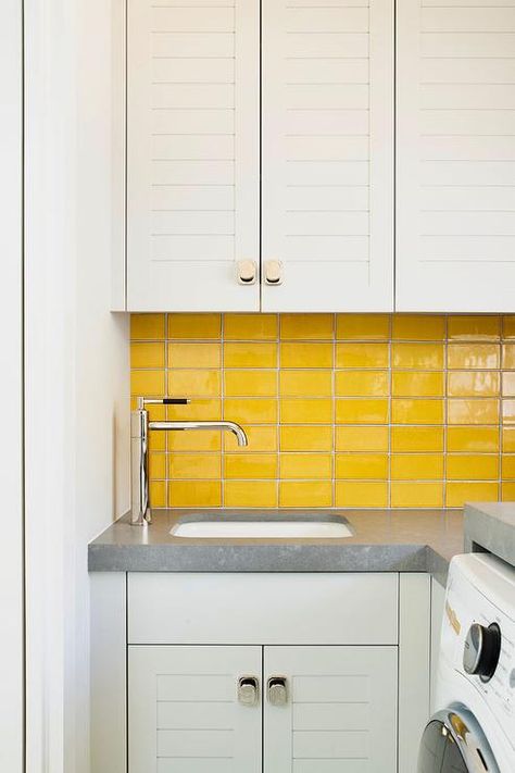 Yellow Backsplash, Yellow Laundry Rooms, Contemporary Laundry Room, Grey Laundry Rooms, Mudroom Flooring, White Laundry Rooms, Light Gray Cabinets, Grey Shelves, Accent Backsplash