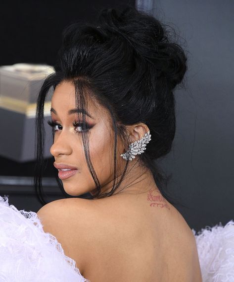 Cardi B Just Revealed A New Back Tattoo — & It’s Huge #refinery29 https://www.refinery29.com/en-us/2020/05/9827387/cardi-b-new-butterfly-tattoo Cardi B Tattoo, B Tattoos, B Tattoo, Cardi B, Back Tattoo, Tattoos, Hair, White, Instagram