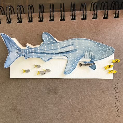 In the process of making a whale shark bookmark! The backer still needs to be painted and the dyed twine that attaches the fish is still drying but she's coming along beautifully! Whale Shark Watercolor, Shark Bookmark, Fish Bookmark, Ocean Bookmark, Shark Watercolour Painting, Whale Bookmark, Notes Art, Custom Bookmarks, Resin Jewelry Diy