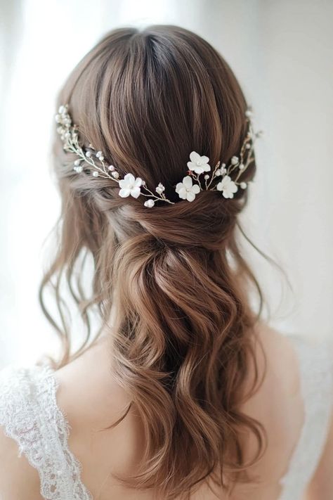 With 51 bridal hairstyles, you’ll find inspiration for every wedding vibe. Whether you’re into wildflower crowns, pinned roses, or trailing floral vines, these styles will make your hair unforgettable. These ideas are perfect for outdoor weddings or classic ceremonies. Explore now! #weddinglooks #bridalflowers #weddinghairstyling Flowers For Hair Wedding, Bridal Hair Wildflowers, Floral Bridal Hairstyles, Wedding Floral Hair Piece, Bridal Hairstyles Flowers, Bridal Hairstyles With Flowers, Floral Hairstyle, Romantic Wedding Hairstyles, Wedding Hair With Flowers