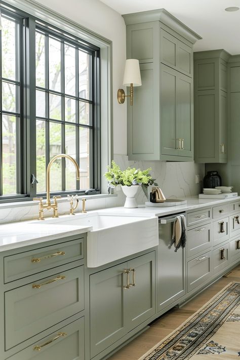 27 Stunning Sage Green Kitchen Cabinets ideas that you need to see - Unique Design Blog Farmhouse Kitchen Sage Cabinets, Sage Green Kitchen Gold Handles, Sage Green Kitchen Cabinets With Granite, Two Toned Green Kitchen Cabinets, Green Shaker Kitchen Cabinets, Sage Kitchen Ideas, Sage Cabinets Kitchen, Sage Green Cabinets Kitchen, Light Green Kitchen Cabinets