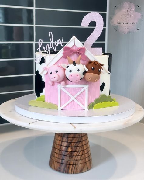 🐷 Pink Barnyard Cake 🐷 Happy 2nd Birthday to Lydia! Cake drum • @cakebonofficial Food gel • @colour.mill Fondant • @wiltoncakes Smoother • @sweet_escape001 Number/name made with • @cricut Everything else! • @heb . . . . . . . #cake #sanantonio #sanantoniosmallbusiness #sanantoniocakes #sanantonioeats #sanantonioevents #sanantoniofood #sanantoniofoodie #sanantoniobaker #bakedsa #bakery #foodie #food #cakeoftheday #cakeofinstagram #cakeoftheweek #cakebonofficial #birthdaycake #smallb... Farm Themed Birthday Cake, San Antonio Food, Barnyard Cake, Farm Cake, Themed Birthday Cakes, Small B, Happy 2nd Birthday, Foodie Food, 2nd Birthday