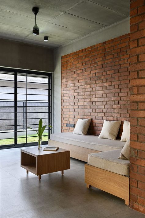 Brick Lattice House designed by Srijit Srinivas – Architects opted for a cuboid envelope, perforated with a brick lattice façade. Photo Credits: Justin Sebastian Photography Brick Wall House Interiors, Exposed Brick Room, Brick House Interior Ideas, Brick House Decor, Interlocking Bricks House, Exposed Brick House, Brick Facade Design, Brick Wall Window, Fluted Glass Partition