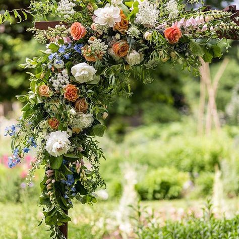 Flower Arch Hanging Flowers, Wedding Arch With Wildflowers, September Wedding Flower Arch, Wedding Floral Arbor, Wooden Wedding Arch With Flowers, Wedding Arch Spring, Wildflower Wedding Arbor, Wedding Flowers Alter, Wildflower Arch Wedding