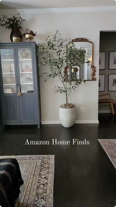 The best faux Olive tree from Amazon, faux tree,  olive tree,  moody living room, living room,  moody dark paint Best Faux Olive Tree, Indoor Olive Tree, Living Room Decor Styles, Moody Living Room, Artificial Olive Tree, Living Room Decor On A Budget, Faux Olive Tree, Washing Walls, Faux Tree