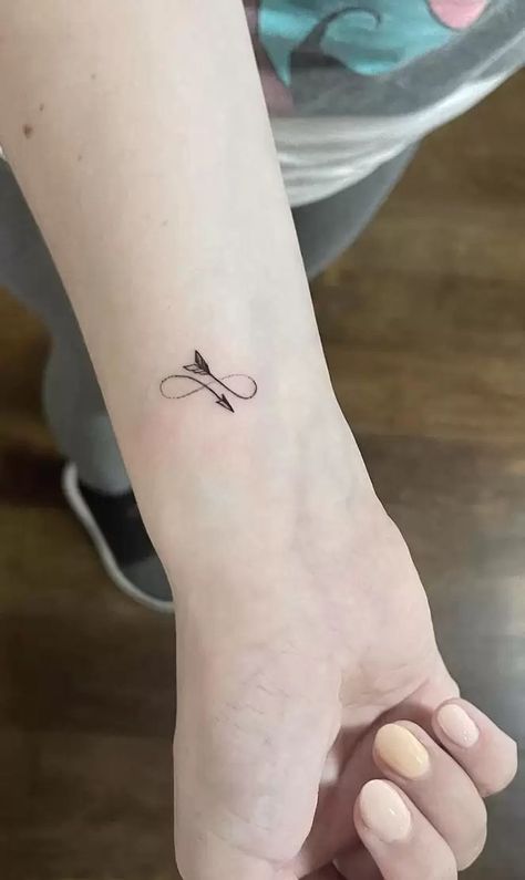 The Meanings Behind The Arrow Tattoo: A Growing Trend Arrow Meaning, Feather Arrow Tattoo, Infinity Arrow Tattoo, Swedish Tattoo, Mens Arrow Tattoo, Meaning Of Arrow Tattoo, Sagittarius Tattoo Designs, Arrow Tattoos For Women, New Beginning Tattoo