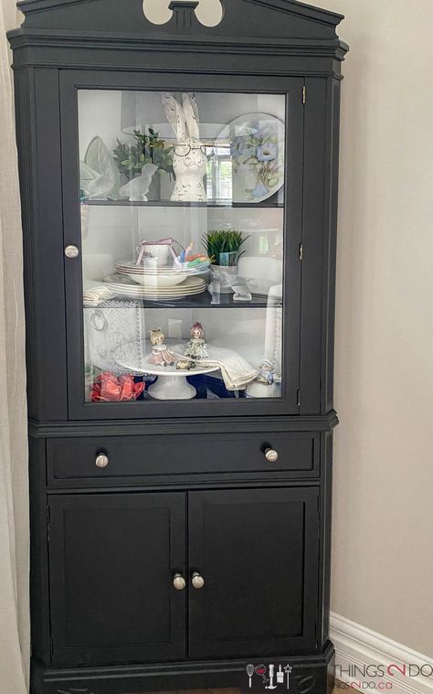 Grandma's corner cabinet makeover | 100 Things 2 Do Refurbished Corner Cabinet, Corner Curio Cabinet Makeover, Corner Hutch Decor, Corner Cabinets Dining Room, Corner Hutch Makeover, Corner Cabinet Makeover, Farmhouse Corner Cabinet, Curio Cabinet Decor, Corner China Cabinet