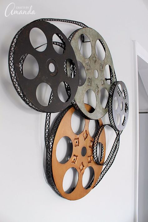 DIY Media Room Ideas - Metal Movie Reel Wall Art - Do It Yourslef TV Consoles, Wall Art, Sofas and Seating, Chairs, TV Stands, Remote Holders and Shelving Tutorials - Creative Furniture for Movie Rooms and Video Game Stations http://diyjoy.com/diy-media-room-ideas Movie Room Wall Decor, Mini Theater Room, Mini Theater, Movie Themed Rooms, Movie Theater Theme, Deco Cinema, Media Room Decor, Theater Room Decor, Movie Theater Decor