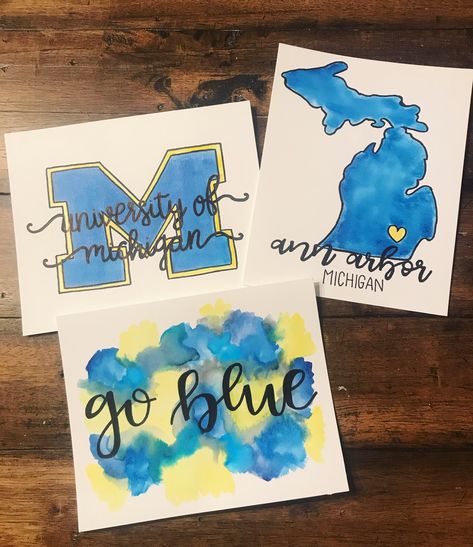 university of Michigan | Ann Arbor | go blue | watercolor | canvas | calligraphy | art | paintings Michigan Painting Ideas, Sorority Canvases, Dorm Room Paintings, Canvas Calligraphy, Dorm Paintings, Michigan Crafts, College Wall Art, College Things, Room Paintings