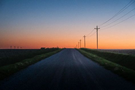 Anyone who's lived in the Midwest long enough has seen a sunset like this before. Clear skies with an orange horizon leading into the deep blue night sky. #sunset #moon #midwest #rural #ruralphotography #rurallife #gravelroad #boring #sunsetvibes #sunsetview #summernights #summervibes #iowa #orange #nightsky #nikon #nikoncreators #lightroom Midwest Sunset, Rural Photography, Blue Night Sky, Gravel Road, Blue Night, Sky Sunset, Clear Sky, Rural Life, Sunset Views