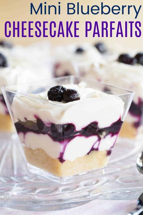 Looking for a delightful party treat? Try these Easy Mini Blueberry Cheesecake Parfaits! Made with a tangy cheesecake filling, sweet blueberries, and a gluten-free almond crust, they’re a light and lovely no-bake dessert that’s ready in minutes. Blueberry Dessert Cups, Parfait Cups For Party, Desserts In A Cup For Party, Gluten Free Baby Shower Food, Cheesecake Parfaits No Bake, No Bake Cheesecake Parfait Cups, Blueberry Parfait Dessert, Mini Cheesecake Parfait Desserts, No Bake Blueberry Cheesecake Cups