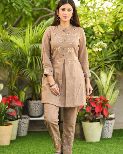 This Beige Cotton Embroidered Tunic Co Ord Set showcases all-over embroidery for a sophisticated touch. Crafted from soft cotton, this set offers comfort and style. Perfect for any occasion, this set is a must-have addition to your wardrobe. Elevate your look with this elegant and versatile ensemble. #sujatra #sujatraglobal #sujatratunics #cortontunic #coordset #cottoncoordsets #embroidery #softcotton #beigecoord #purecotton #summeressentials All Over Embroidery, Coord Sets, Coord Set, Embroidery Neck Designs, Embroidered Tunic, Cute Easy Drawings, Co Ord Set, Elevate Your Look, Kurti Designs